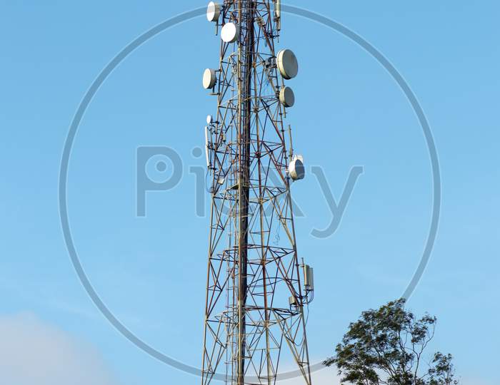 Mobile tower on green mountain