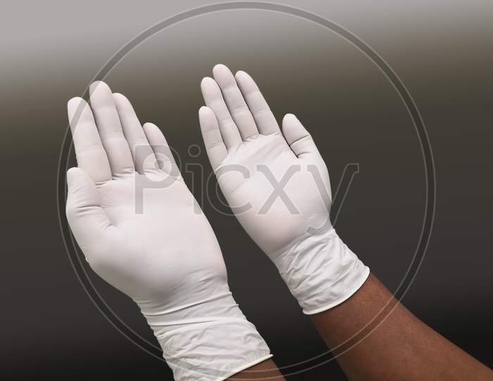 Sterile Glove In Hand Before Surgical Procedure