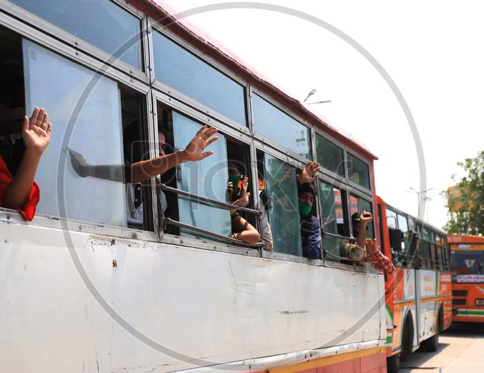  Migrant Workers Wave After Boarding Buses Towards their hometowns During Nationwide Lockdown Amidst Coronavirus Or COVID- 19 Pandemic, in Prayagraj, May 10 , 2020