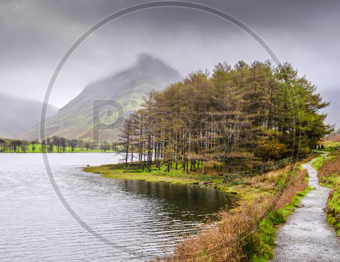 A view of Buttermere Lake with mount Fleetwith Pike in the background