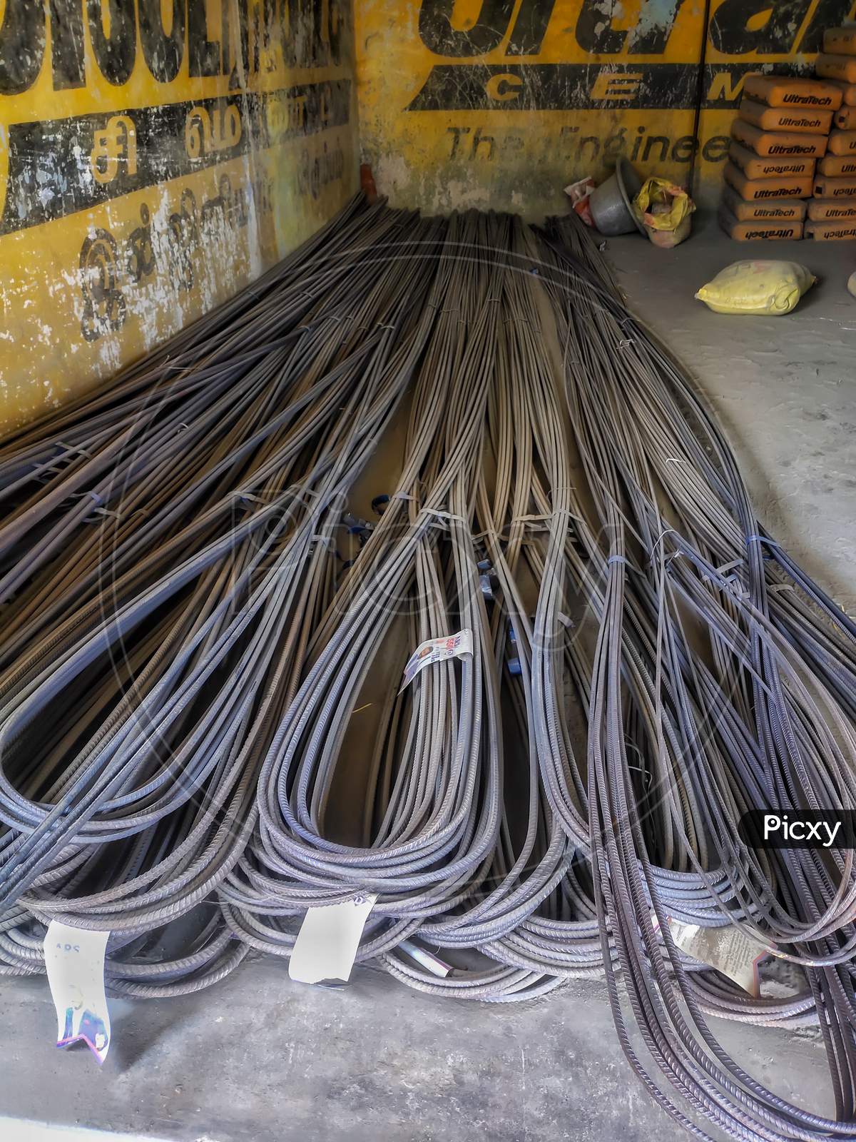 Bunch Of Iron Steel Rod Bar For Construction Building On Godown Or Warehouse.