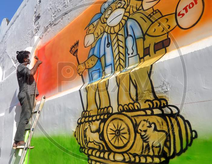 An artist Draws A  Mural On A Wall To Spread  Awareness  During Nationwide Lockdown  Amidst Coronavirus Or COVID-19 Pandemic  In Guwahati, Wednesday, May 6, 2020.
