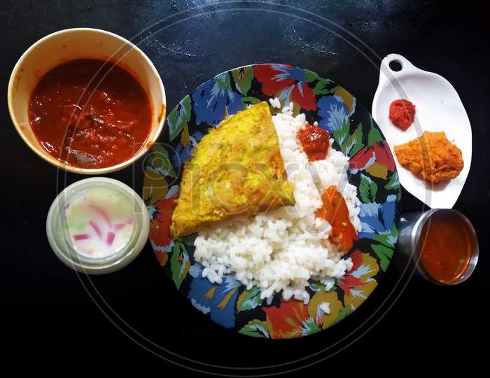 Kerala Style Spicy Rice,Curry,Chandni And Fish Curry