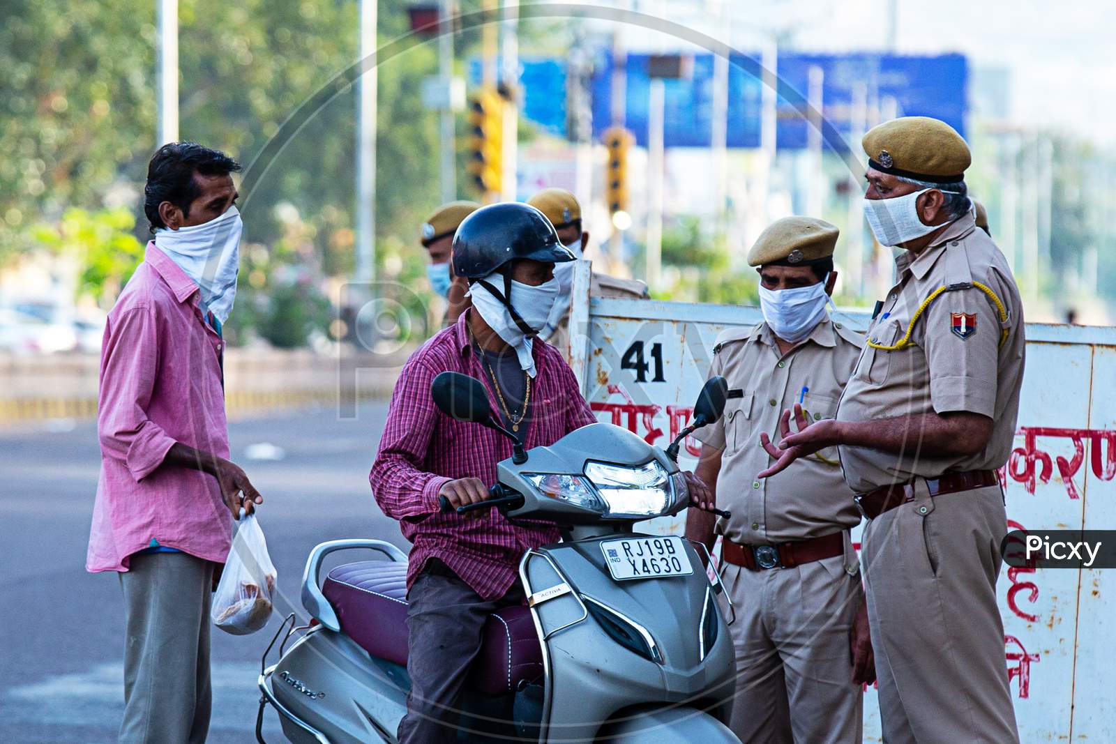 Jodhpur, Rajashtbn, India. 30 March 2020. Police Stops Citizen, Commuters, Etire Countary Lockdown To Prevent The Spread Of Coronavirus. Local Police Checks Vehicle During Covid 19 Pandemic. Stay Home.