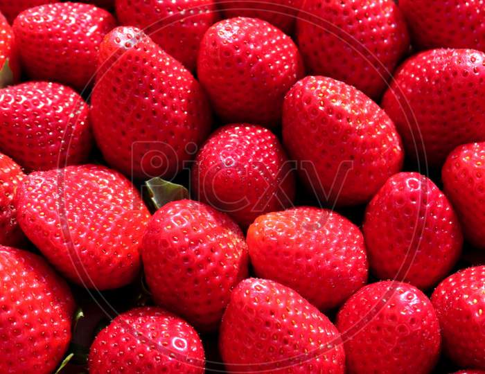 Strawberries background. Strawberry. Food background, nutritious food.