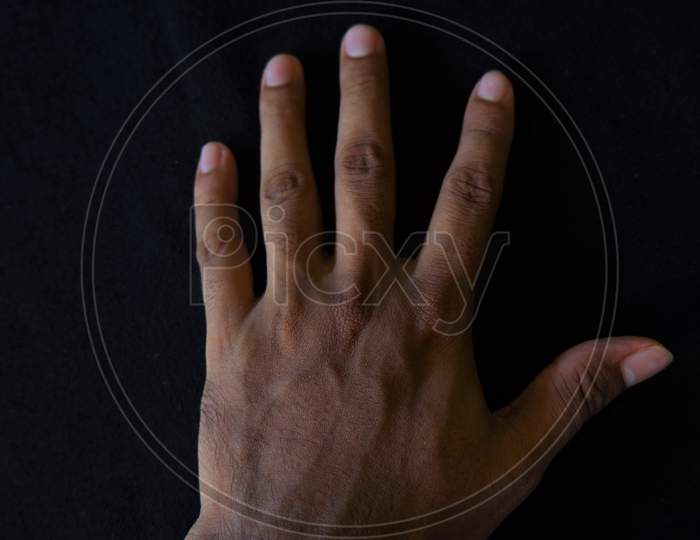 different symbols of hand in black background