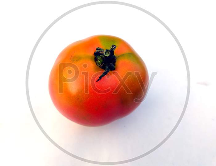 some fresh red tomato isolated on white background