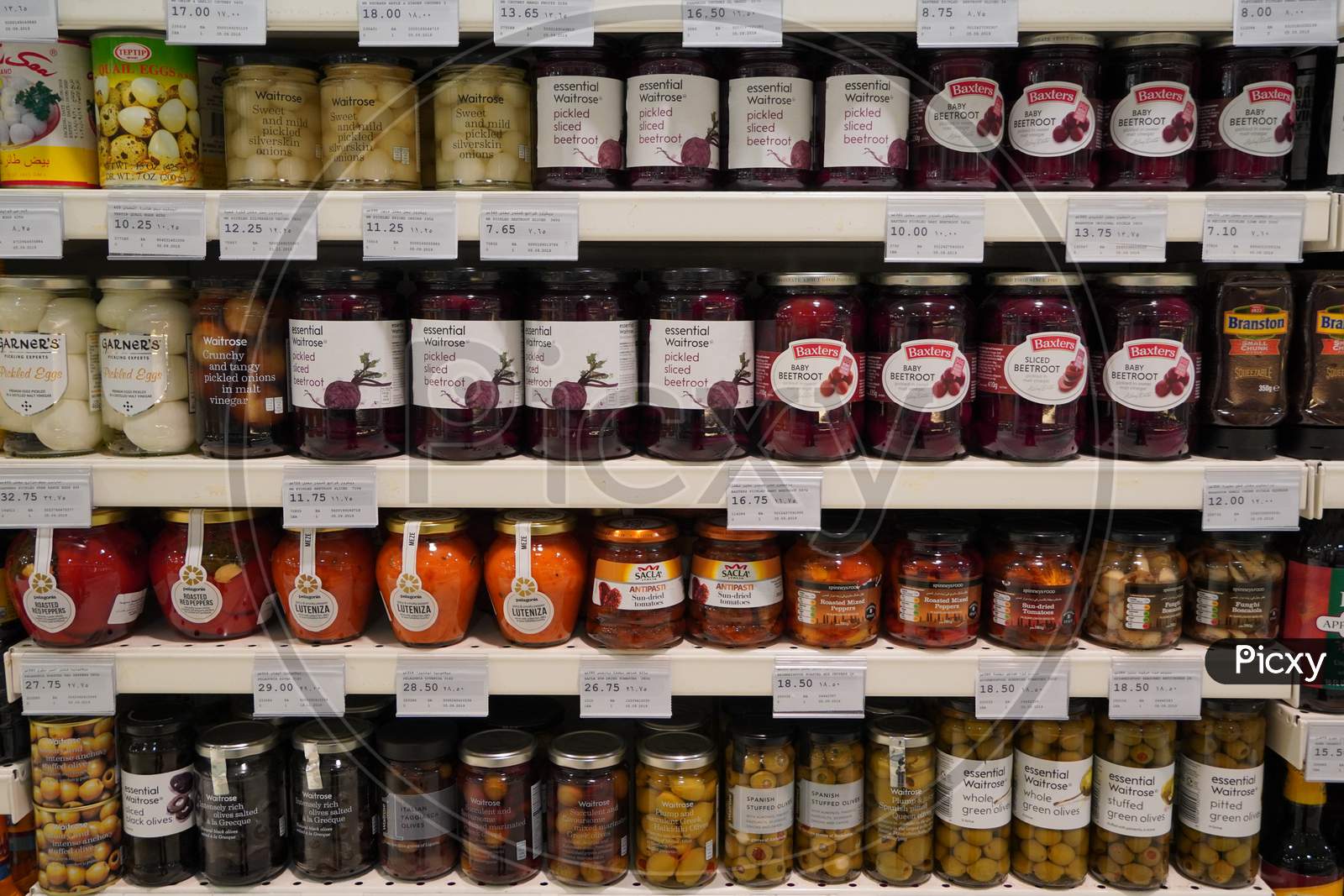 Traditional Turkish Pickles Of Various Fruits And Vegetables. Jars Of Salted Pickles On A Store Shelf. Beetroot, Olives, Cabbage, Cucumber, Onion, Tomato.