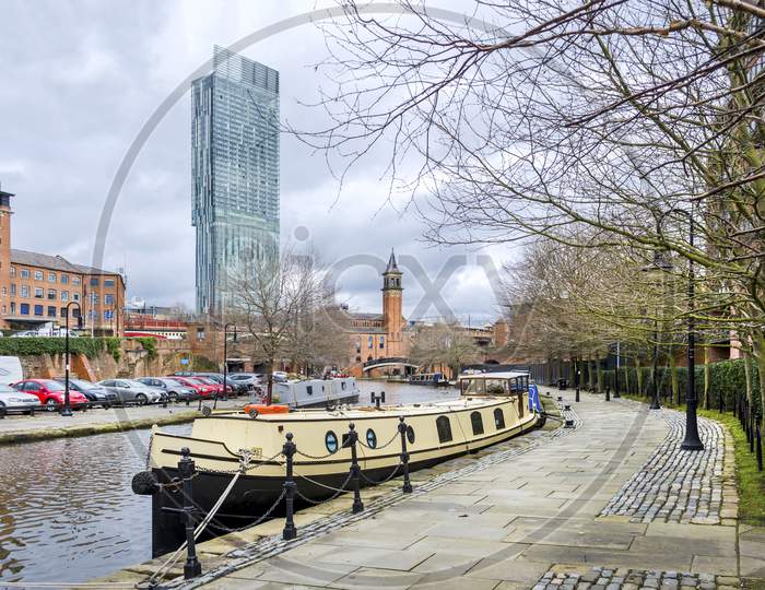 The Bridgewater canal at Manchester with a longboat.
