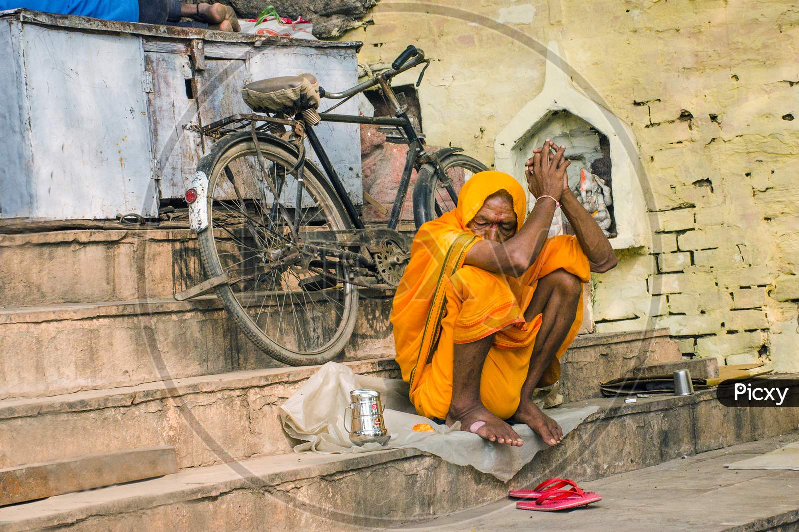 lonely cycle and sadhu at varanasi