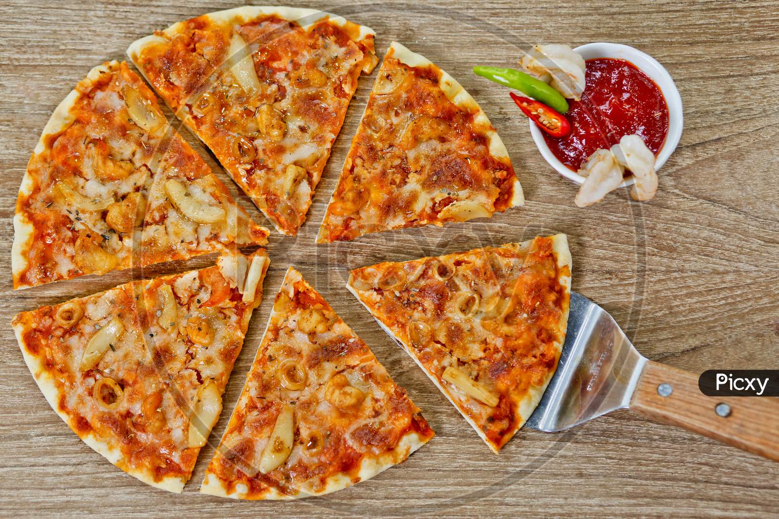 Classic Seafood Pizza With Spicy Chilli Sauce.