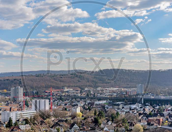 Cityscape of Brugg West with industry and the dam.