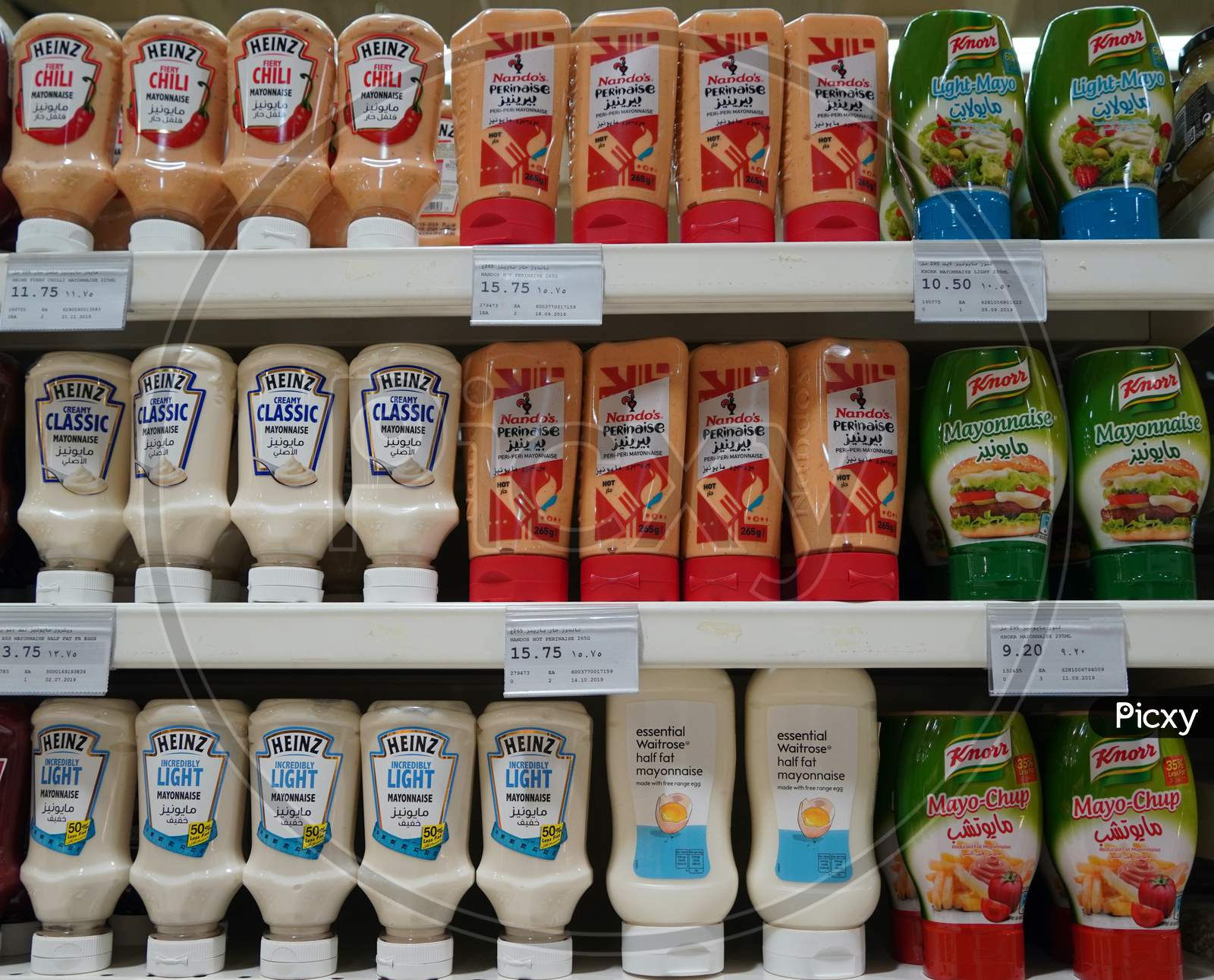 Variety Of Heinz, Knorr Nandos Brand Tomato Ketchup And Mayonnaise Display In Store For Sale. Light Mayo, Chilli Mayo Sauce. Bottles Of Various Sauces On Shelves. India