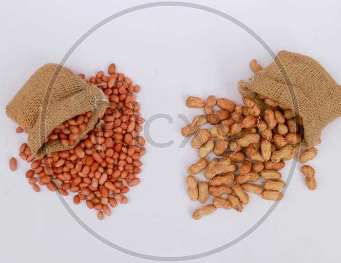Ground Nuts In A Bag And Glass Photography Isolated On A Background India