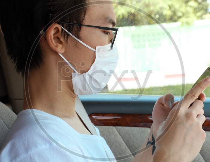 Man wearing hygienic mask to prevent infection.