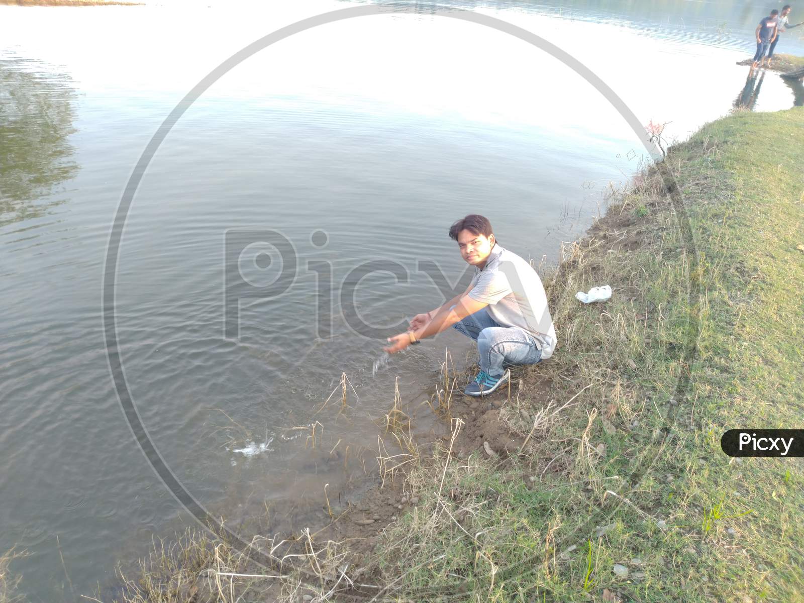 Indian man inside of beautiful tourist place river and mountain