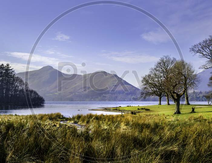A peaceful view of the mountain range and Derwent Water in Cumbria.