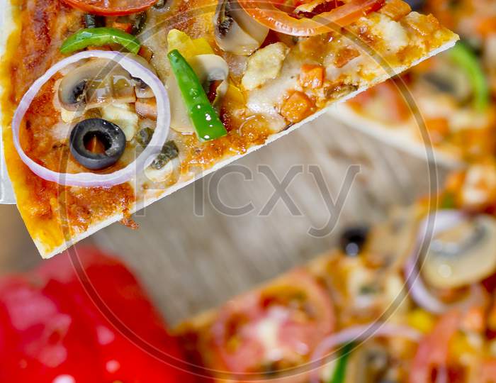 Popular Colorful Ingredients As Like Tomatoes, Cheese, Mushroom, Capsicum, Olives And Other Ingredients Baked Healthy Pizza.