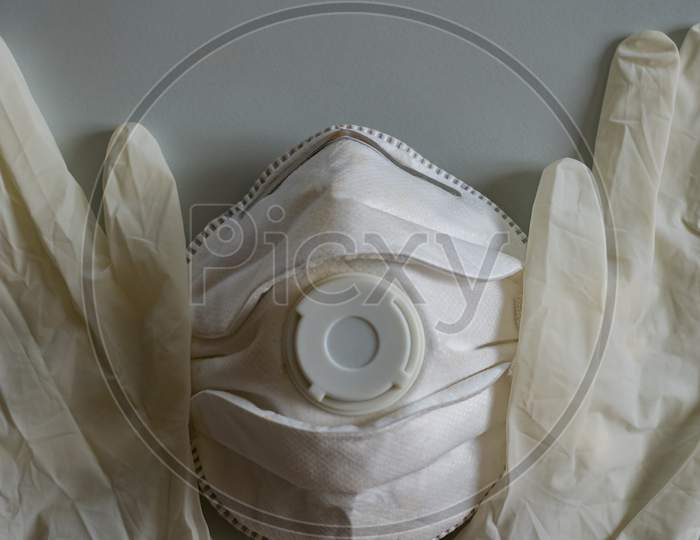 Mask protection with rubber gloves in time of influenza.