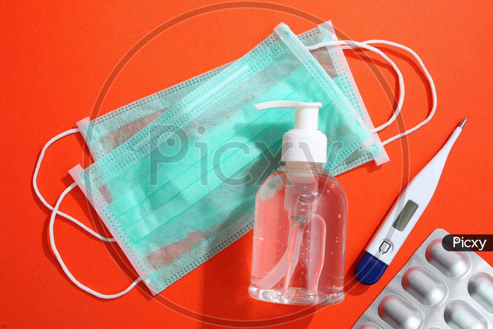 Novel Coronavirus - 2019-Ncov, Disposable Surgical Mask, Medicines,sanitizer And Thermometer Background.