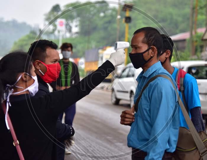 Thermal Screening Of  Commuters Being Conducted  During Nationwide Lockdown Amidst Coronavirus Or COVID-19 Pandemic  At Byrnihat In Ri Bhoi District Of Meghalaya ,India