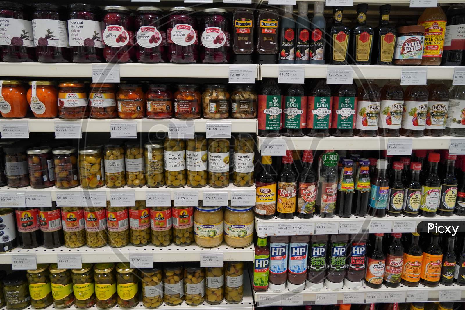 Dubai Uae December 2019 Traditional Turkish Pickles Of Various Fruits And Vegetables. Jars Of Salted Pickles On A Store Shelf. Beetroot, Olives, Cabbage, Cucumber, Onion, Tomato.