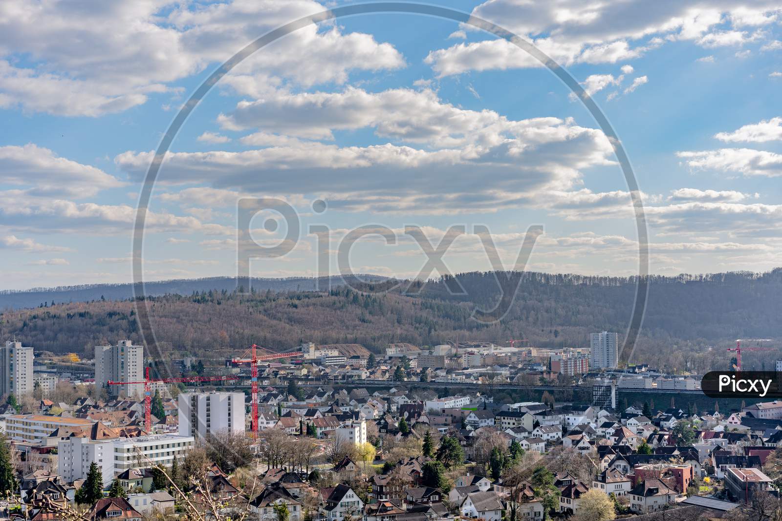Cityscape of Brugg West with industry and the dam.