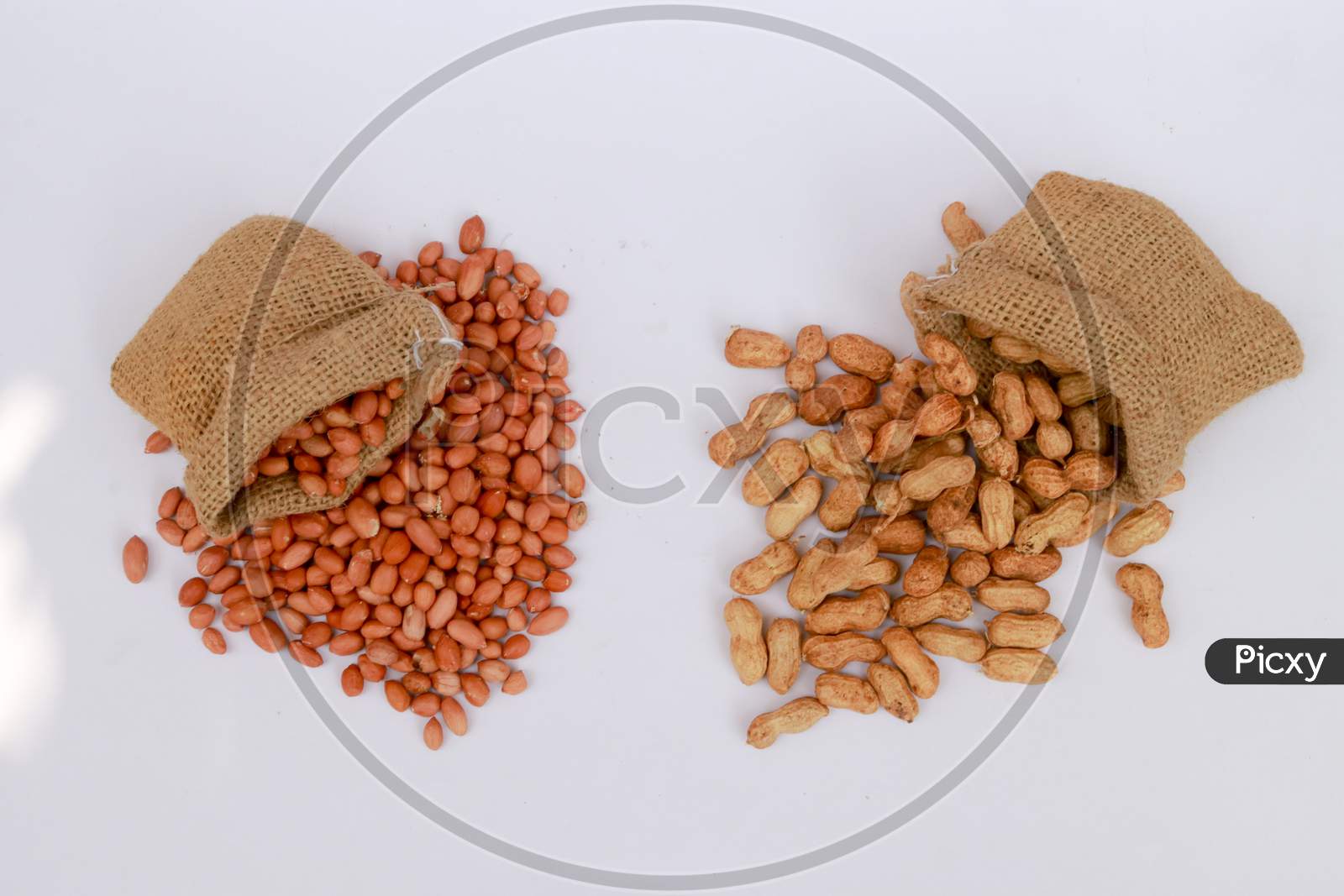 Ground Nuts In A Bag And Glass Photography Isolated On A Background India