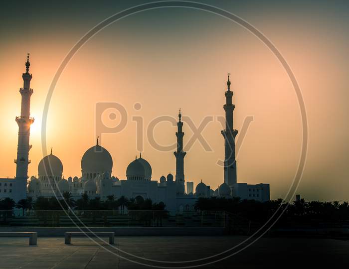 The Sheikh Zayed Grand Mosque at sunset - evening time.
