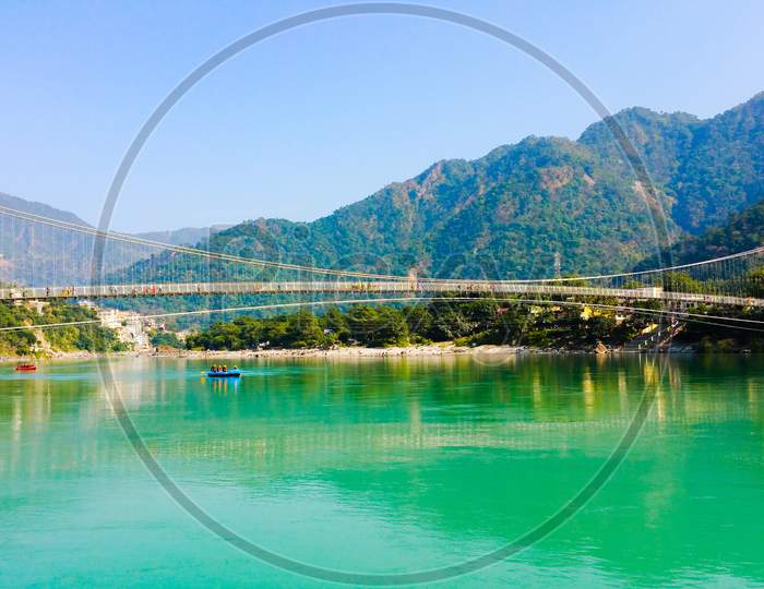 Scenic Ganga river against the backdrop of Himalayas in Rishikesh