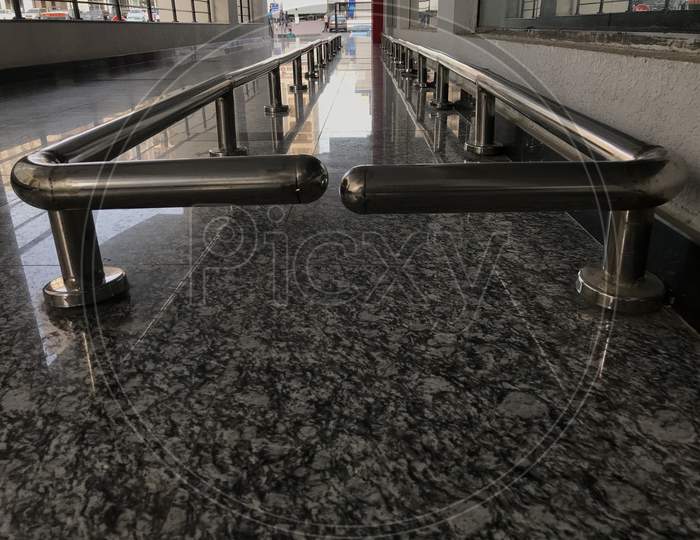 Stainless Steel Rails For Keeping Shopping Trolley Vehicles In Line So That Customers Can Take In Disciplined Way For Purchase