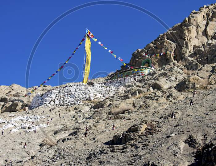 Mountain Decorated With Beer Bottle At Leh