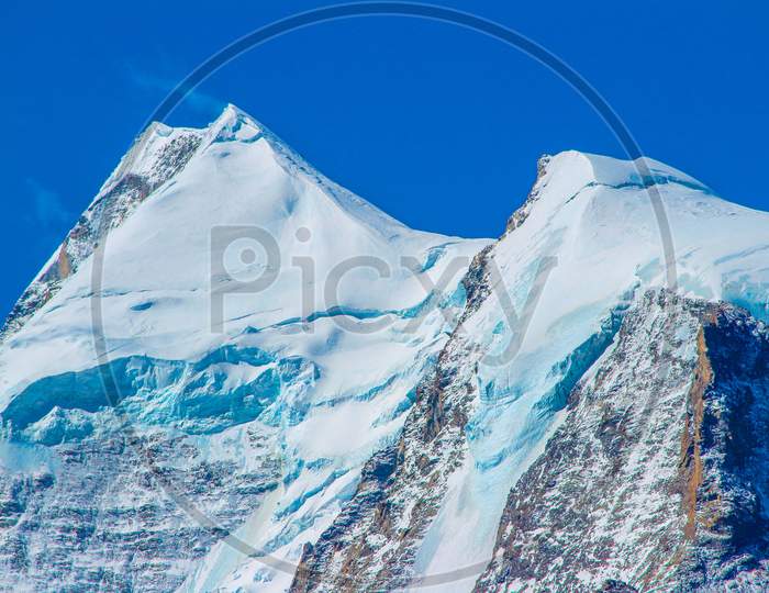 The Beautiful Snow Covered Glacier - under the blue sky