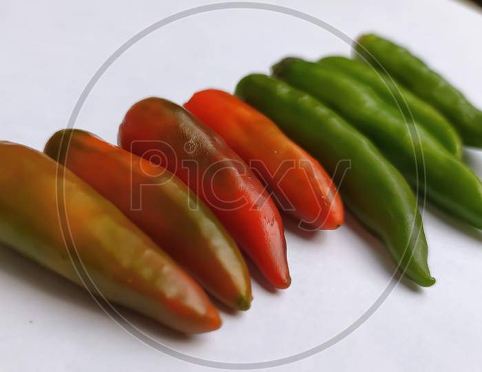 Green chili peppers, red chili's