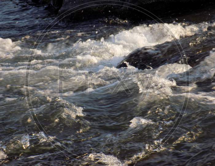Strong current of water in river