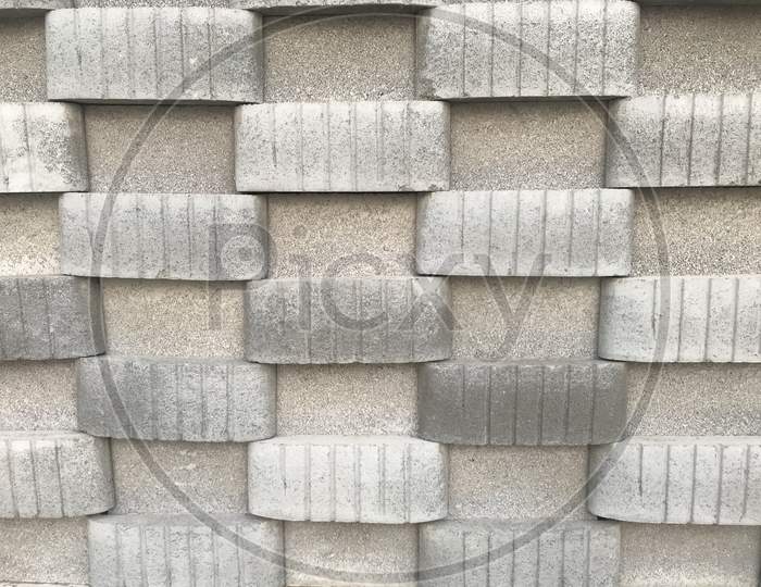 Concrete Block Wall Constructed For Public Toilet In Three Dimensional View Like In And Out Pattern Using Blocks Cement And Sand Bond