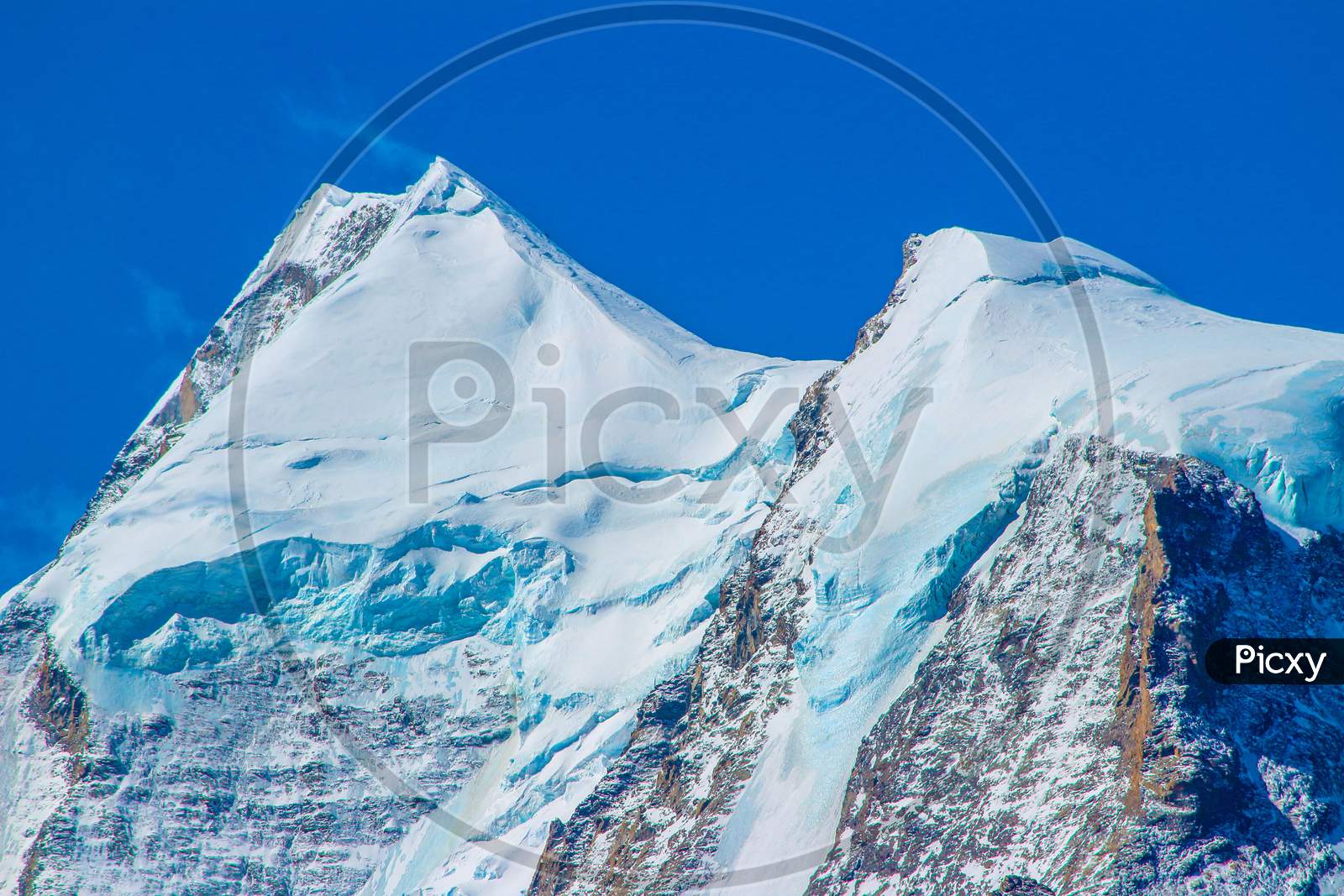 The Beautiful Snow Covered Glacier - under the blue sky