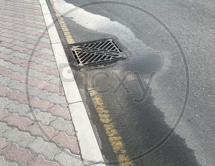 Drainage Water Getting Diversion From The Manhole Due To Poor Workmanship In Compaction Which Leads Uneven Settlement Of Soil