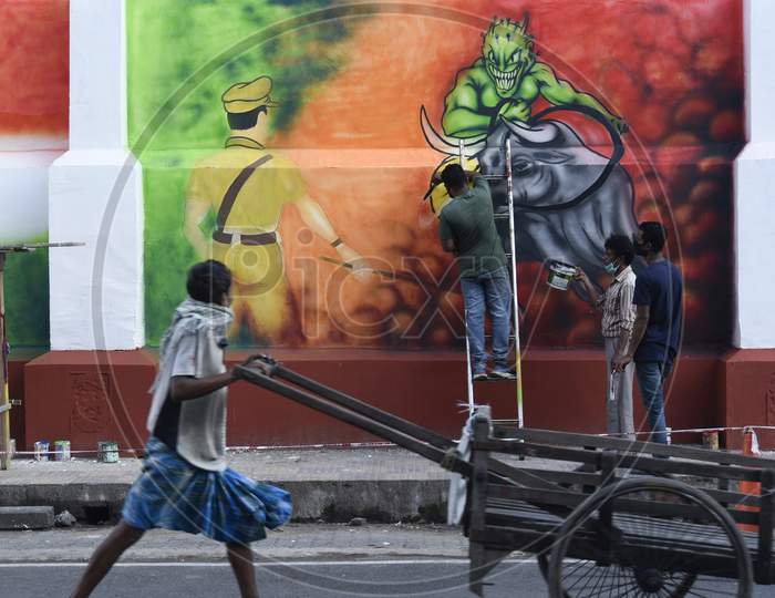 Artist Draws A Mural On A Wall To Spread Awareness, During The Ongoing Covid-19 Lockdown, In Guwahati, Wednesday, May 06, 2020.