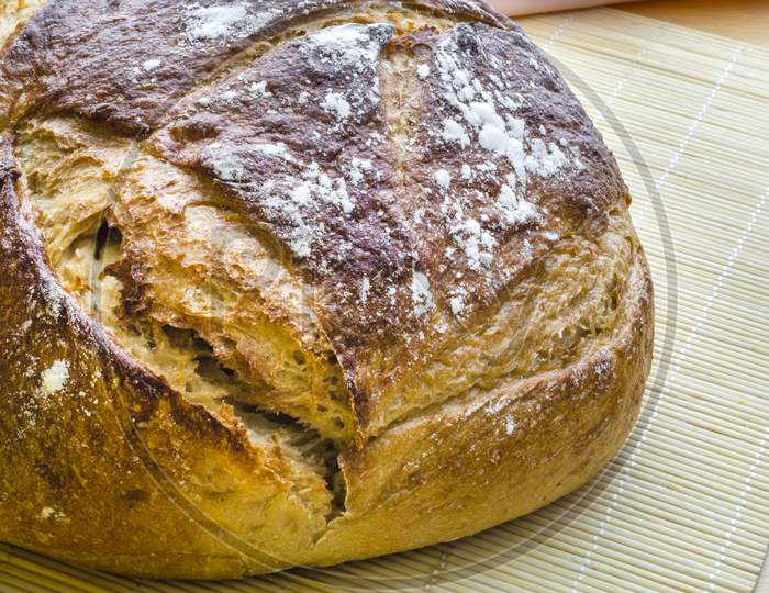 A loaf of sourdough bread freshly baked.