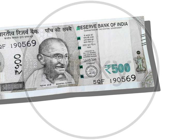 Indian currency note of 500 rupees, with the photo printed of Mahatma Gandhi on it -isolated image. The Reserve Bank of India Indian (RBI) launches the currency notes.