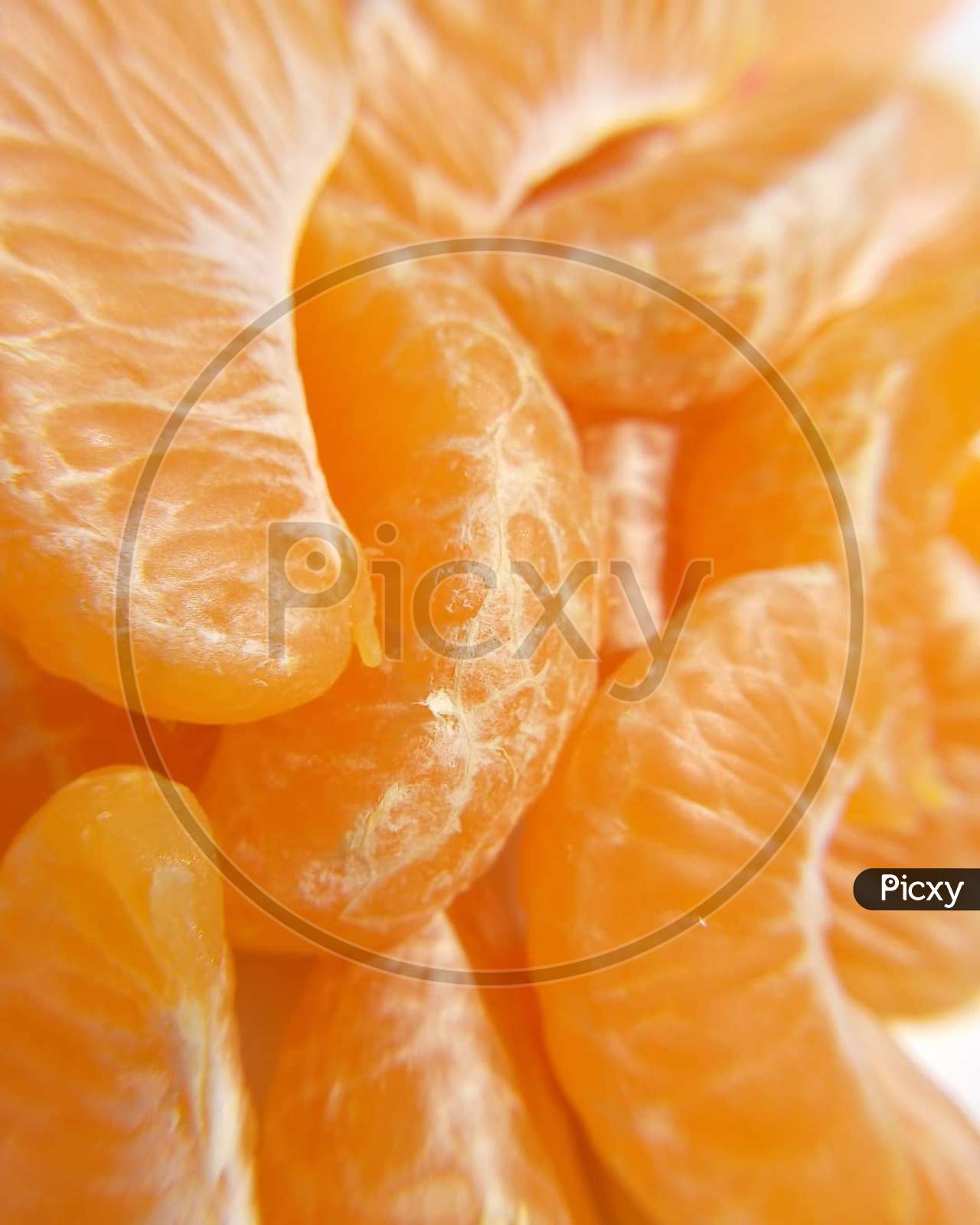 Oranges closeup in bulk juicy
