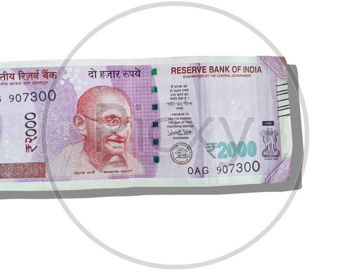 Indian currency note of 2000 rupees, with the photo printed of Mahatma Gandhi on it -isolated image. The Reserve Bank of India Indian (RBI) launches the currency notes.