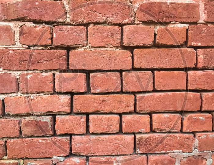 Agra/India - May 8, 2020: red brick wall on agra fort, Agra Tourism