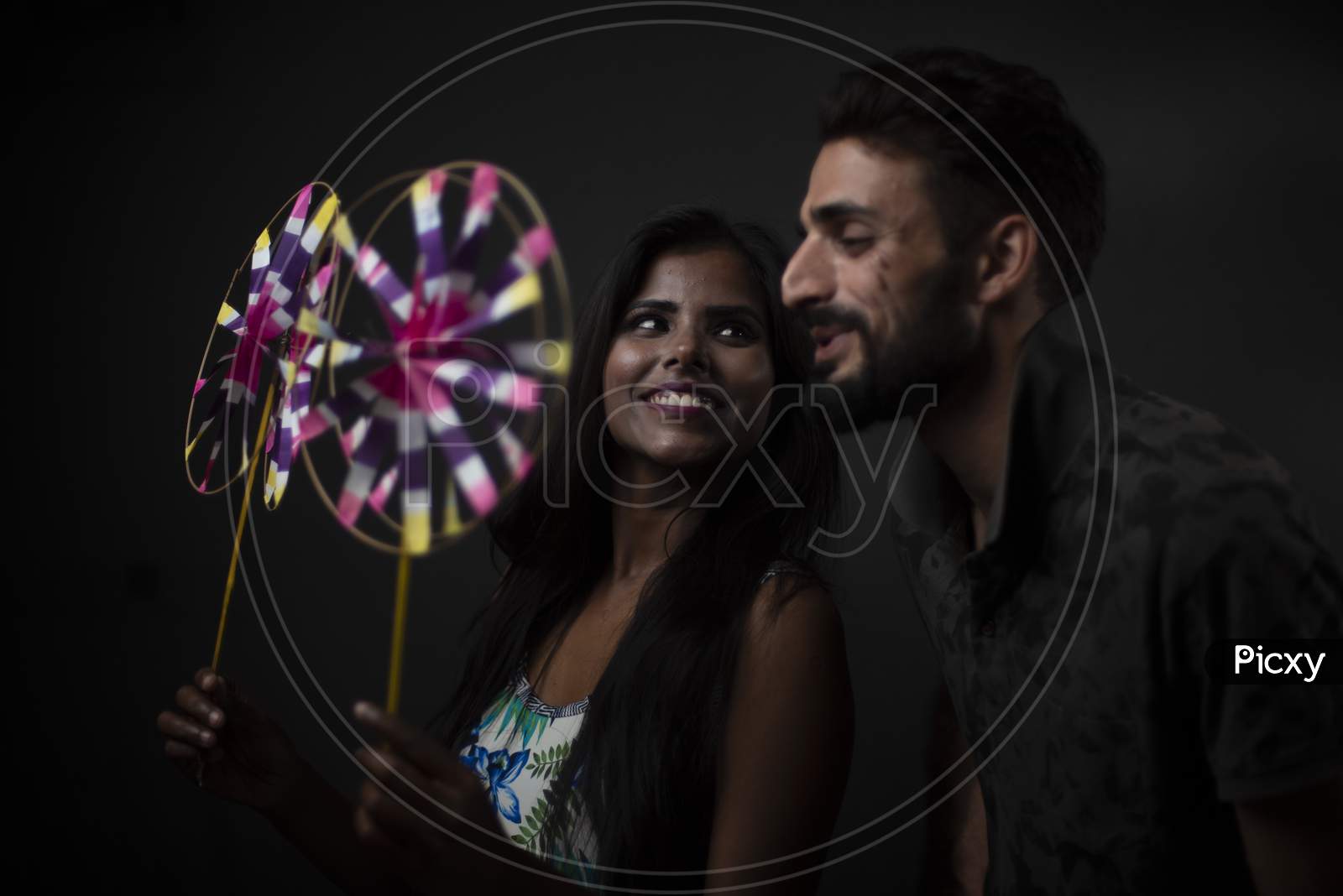 Image Of A Dark Skinned Indian African Girl Floral Western Dress And A Kashmiri European Arabian