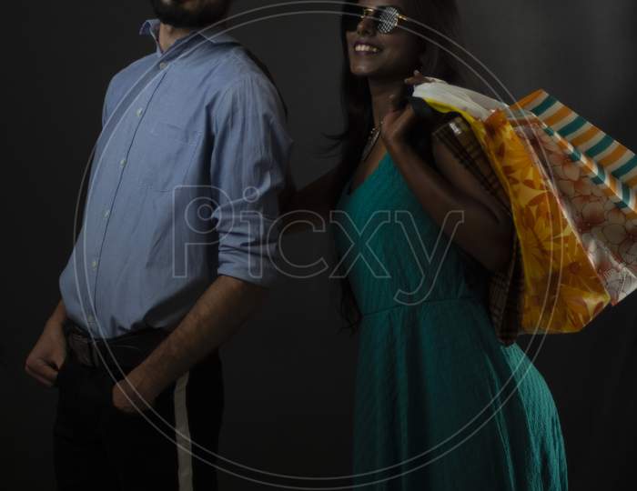 Image Of A Dark Skinned Indian African Girl And A Kasmiri European Arabian Man In Formal Wear