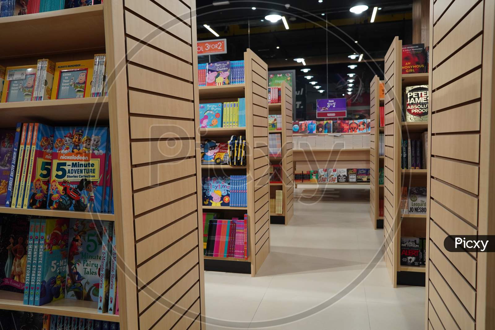 Aisle Between Shelves Of Library Books, In An Education Background Like Library. The Passage Between The Shelves Full Of Books In Book Store. : Dubai Uae - March 2020