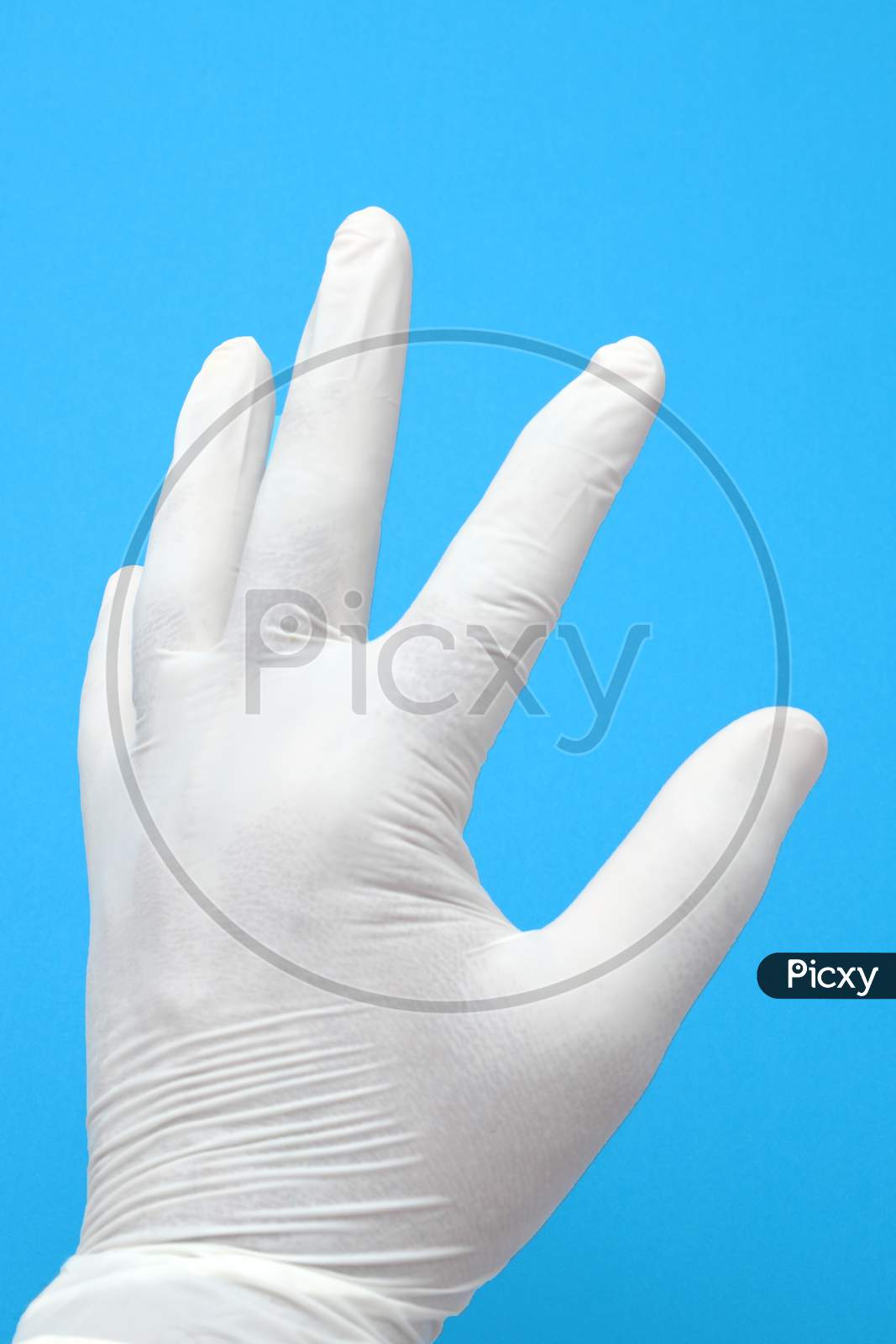 Disposable Sterile White Gloves On White Background,Showing Gesture, Medical Protective Gloves Isolated
