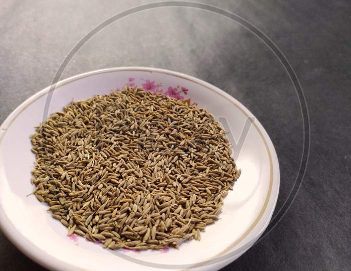 Cumin seeds on a plate.