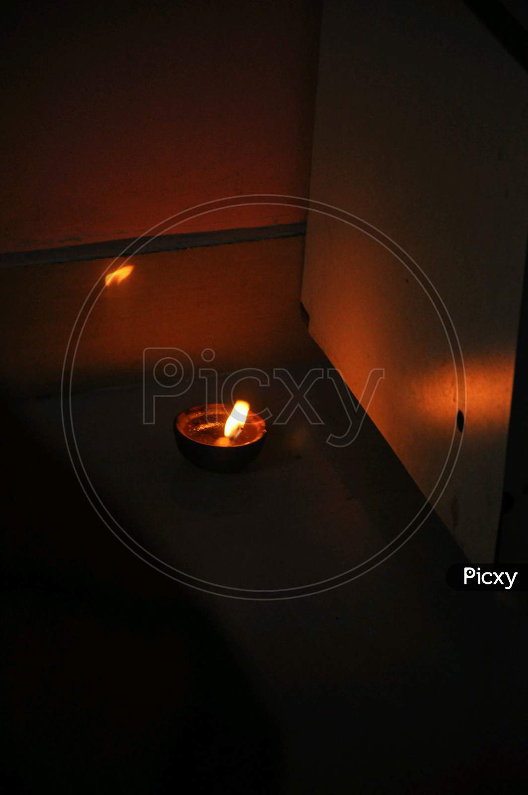 Celebrate Diwali with diya and candle